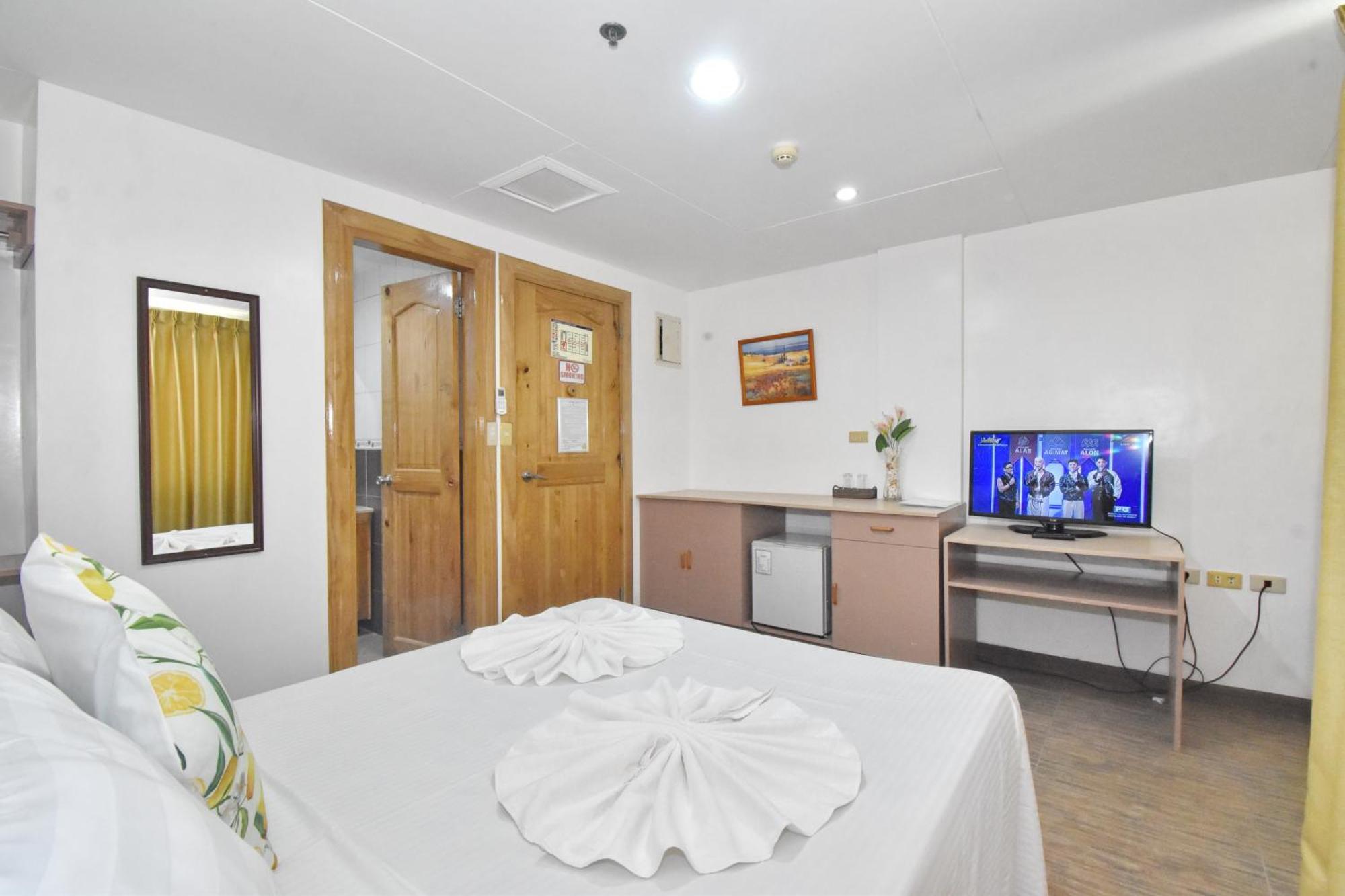 Blue Lotus Hotel Balabag  Phòng bức ảnh